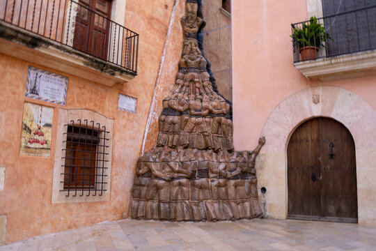 Castellers Monument in Pla&ccedil;a del Pou, Altafulla, Tarragona &ndash; a tribute to Catalan human tower tradition.