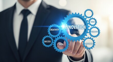 A businessman in a suit pointing at blue gears with words like innovation and creativity on them