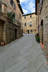 Stone masonry and brick, Medieval houses on both sides of Via dei Fabbri Street reaching up to Via Bedini Street. Monticchiello-Tuscany-Italy-074