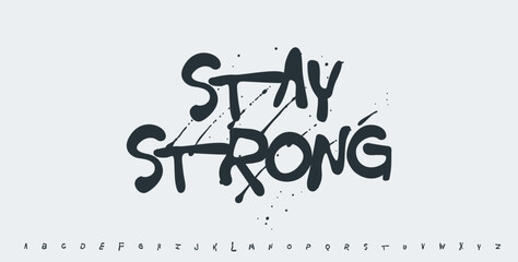 Graffiti style motivational quote Stay Strong. Urban brush lettering with grunge texture, splash ink for posters, cards, social media, street art. Vector illustration.