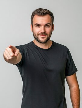 man pointing forward confident gesture clean background