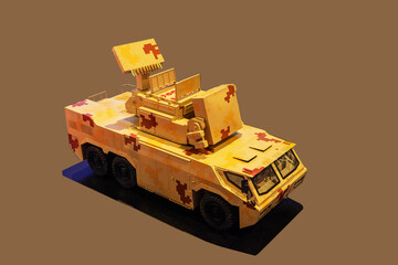 Military cars, trucks, models on a white background, at a military exhibition in Baku, Azerbaijan.
