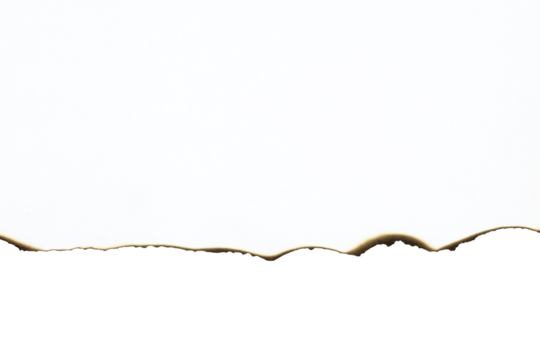 Burnt paper edge with an uneven, wave-like line. Grunge vintage border texture for design or separating elements. isolated on white background with clipping path.