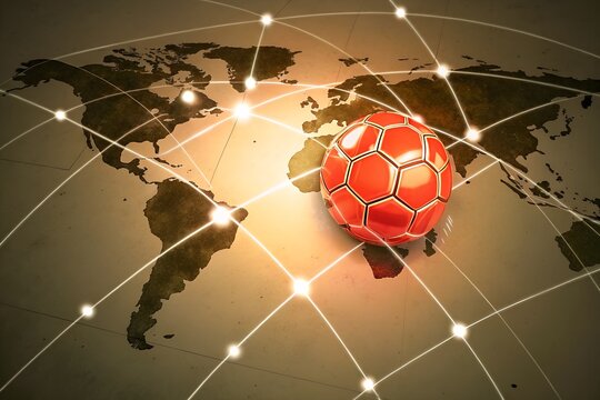 A red soccer ball rests on a world map with glowing lines connecting points across the globe