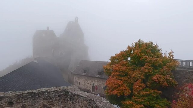 Mistical autmn view of Aggstein Castle. Fabulous morning scene of ancient stone 12th-century castle ruins atop a rocky outcrop offering views of the Danube river. 4K video (Ultra High Definition).