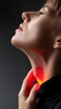 Throat discomfort: inflammation symbol, red glow, viral infection, sore sensation, thyroid issues, micro-nodules, tonsil pain, cold symptoms, health challenge, vocal distress, respiratory condition.