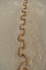 Obraz premium Kette im Sand