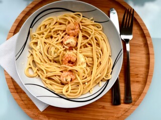 delicious spaghetti with shrimps, tomatoes, basil and cheese - italian food style. 