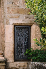 A polychrome stained glass window is a composition made with colored glass.