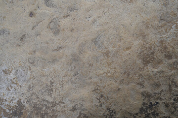 Old grunge weathered cement stone wall texture