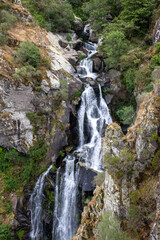 Fervenza do Toxa waterfall, one of Galicia’s best, framed by vivid green nature from a stunning viewpoint in Silleda, Pontevedra.