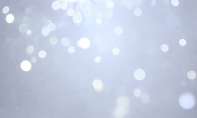 Silver bokeh lights twinkling across a white background with slow drifting sparkles and ambient shimmer - Powered by Adobe