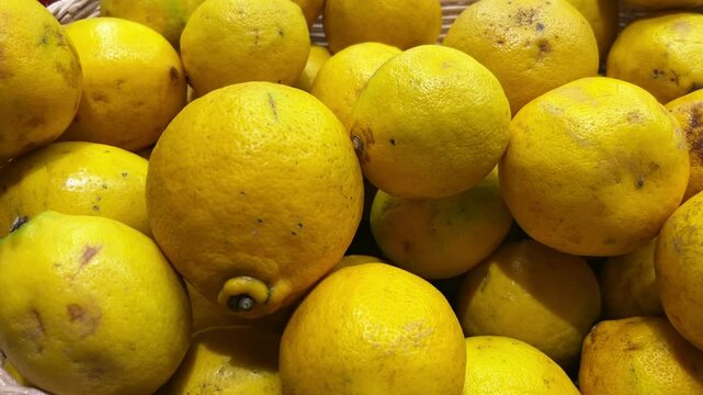 yellow lemon on market stall