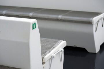 green symbols for marking life jackets for emergency are also present on seats on the sun deck