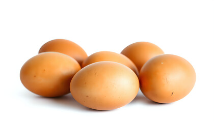 Brown eggs on a white surface, showcasing natural texture and subtle shadows in a minimalist composition.