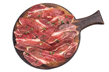 Slovenian ham, sliced cured pork meat on wooden board, Prsut isolated on white background. top view