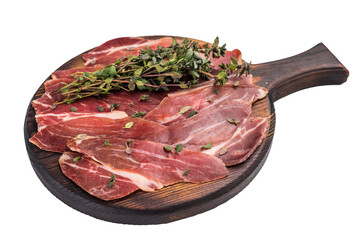 Guanciale dried speck ham, pork cured meat on wooden board isolated on white background. top view