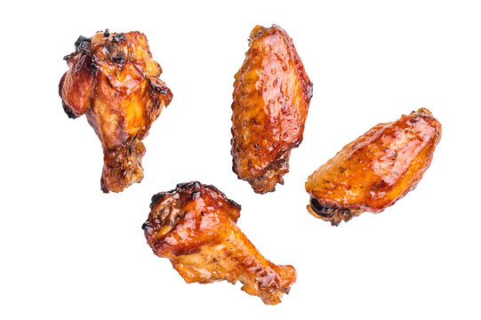 Deliciously sticky teriyakis sauce chicken wings, bursting with flavor, perfect for sharing at festive occasions or family dinners. isolated on white background. top view