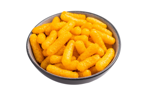 Deliciously addictive cheese flavored corn puffs, beautifully arranged on a plate. isolated on white background. top view