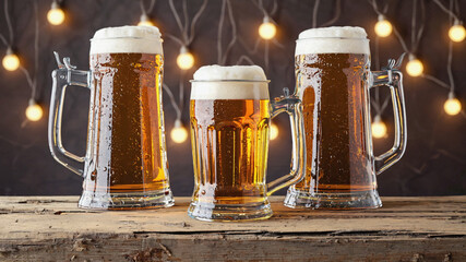 Chilled Beer Mugs Clinking Together in Pub Setting

