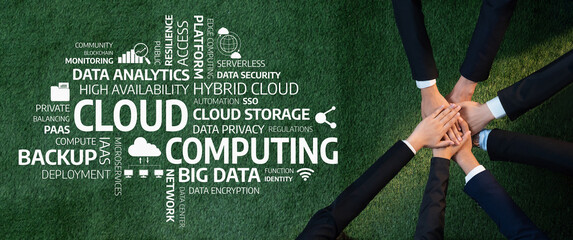 Hands coming together on a green grass background, showcasing the collaborative effort in cloud...