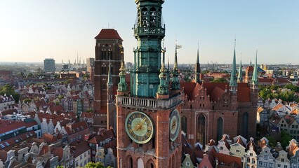 Aerial photo taken by drone over the historic tourist center of Gdansk, the city hall and the cathedral on a summer day, Poland, Europe