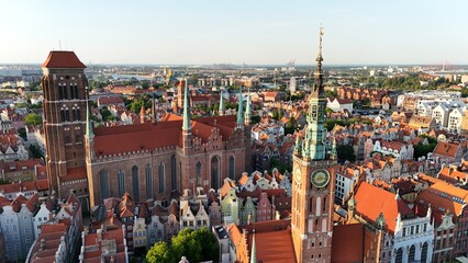 Aerial photo taken by drone over the historic tourist center of Gdansk, the city hall and the cathedral on a summer day, Poland, Europe