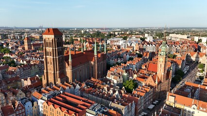 Aerial photo taken by drone over the historic tourist center of Gdansk, the city hall and the cathedral on a summer day, Poland, Europe