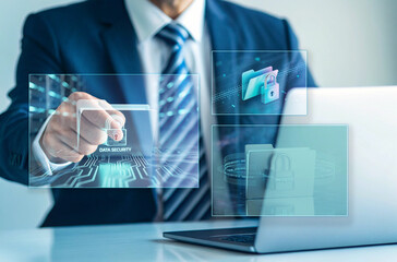 Businessman interacting with holographic interface displaying data security and protected files