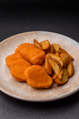 Crispy chicken nuggets, meat takeaway meal with salt. Chicken nuggets, fast food
