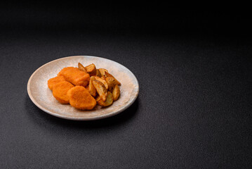Crispy chicken nuggets, meat takeaway meal with salt. Chicken nuggets, fast food