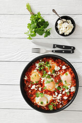 shakshuka, eggs poached in tomato vegetable sauce
