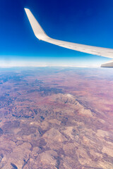 Aerial view on arabian desert and Red sea mountains from airplane