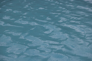 Close-Up of Calm Lake Water Surface with Gentle Ripples, silent mountain lake in Switzerland