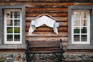 Rustic Wooden House with Decorative Buckets