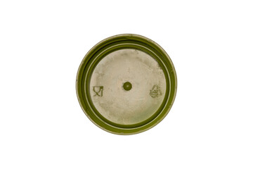 Round green plastic bottle cap viewed from inside is isolated.