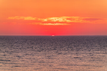 Beautiful red and orange sunrise over the sea.