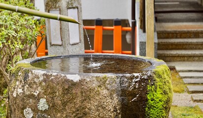 Bamboo water feature fountain at a Japanese temple