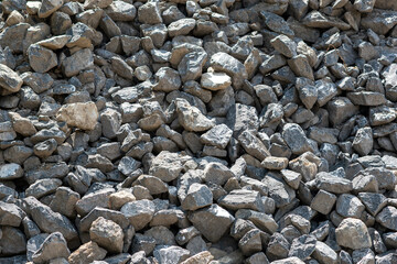 Natural and rough stone background, gray stone background, wide spread gray pebble background