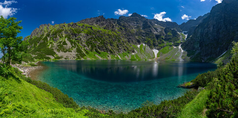 Panorama of Czarny Staw pod Rysami, a mountain lake in the Tatra Mountains in Zakopane, Poland © momo11353