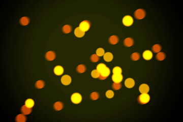 Abstract blurred background of golden bokeh with light effect