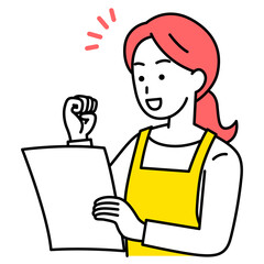 書類を見て喜ぶエプロン姿の女性