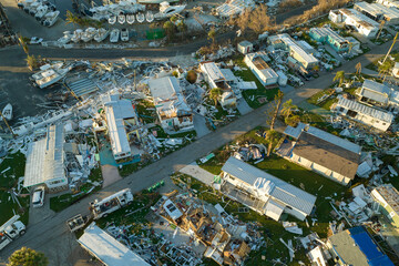 Aerial view of badly damaged mobile homes after hurricane Ian swept through residential area in...