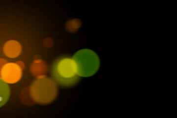 Abstract blurred background of green bokeh with light effect