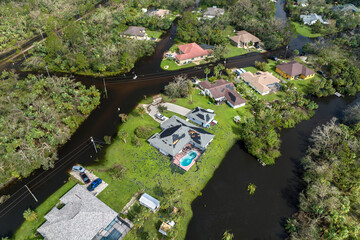Heavy flood with high water surrounding residential houses after hurricane Ian rainfall in Florida...