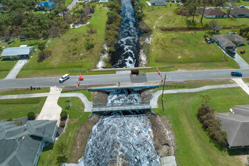 Repair of destroyed bridge after hurricane flood in Florida. Reconstruction of damaged road after...