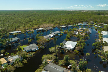 Surrounded by hurricane Ian rainfall flood waters homes in Florida residential area. Aftermath of...