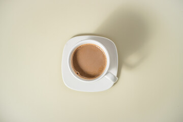 Flat lay of a ceramic cup of coffee