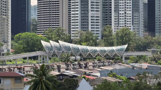 sunny day kuala lumpur city central cityscape famous walking pedestrian bridge aerial panorama 4k malaysia