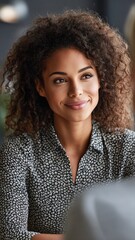 medium shot, Black female HR manager in modern office, interviewing job candidate, confident and approachable, professional work setting